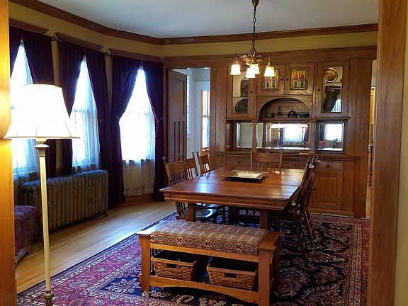 Formal Dining room with built in buffet and stained glass
