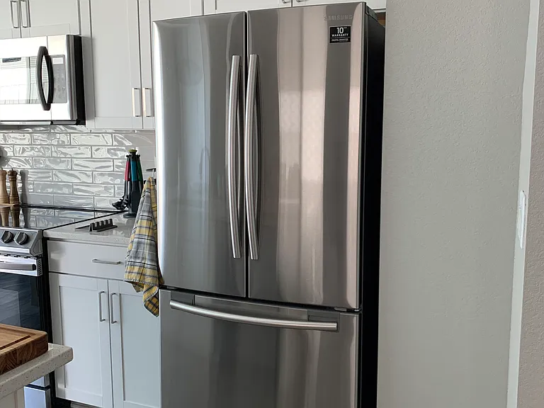 Double door refrigerator and freezer