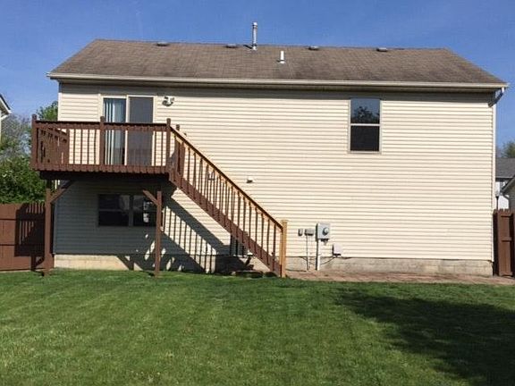 View of yard, deck and patio