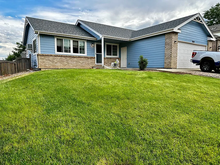 Front yard with sprinkler system