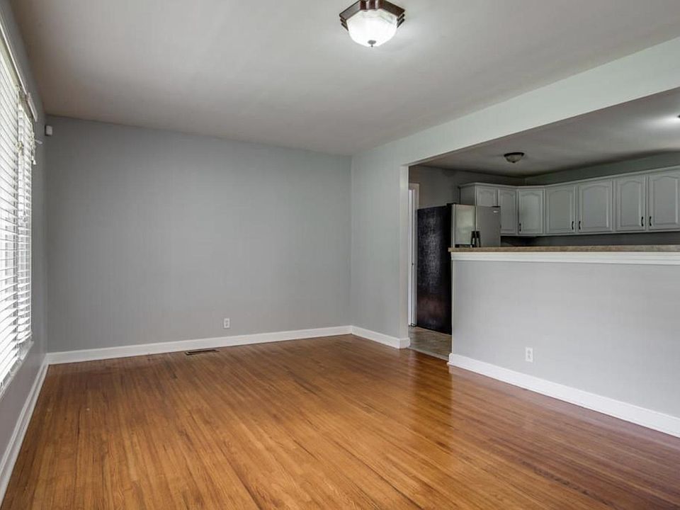 Living Room very spacious with beautiful finished hardwood floors.