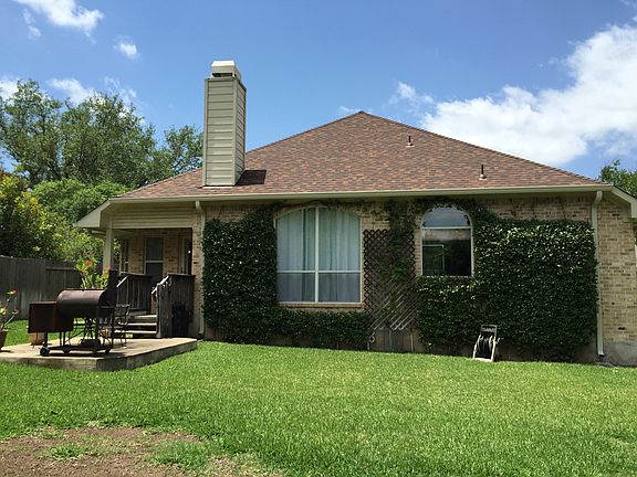 Back yard view of house