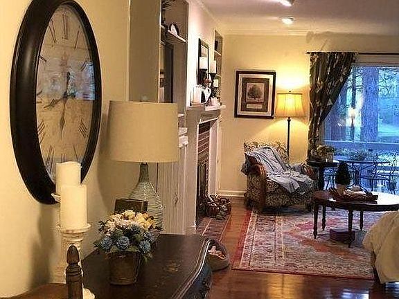 Entry foyer leads to Living Room with view of back yard.