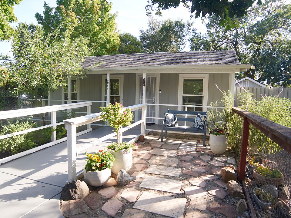 Front ramp to porch, hard scape patio section