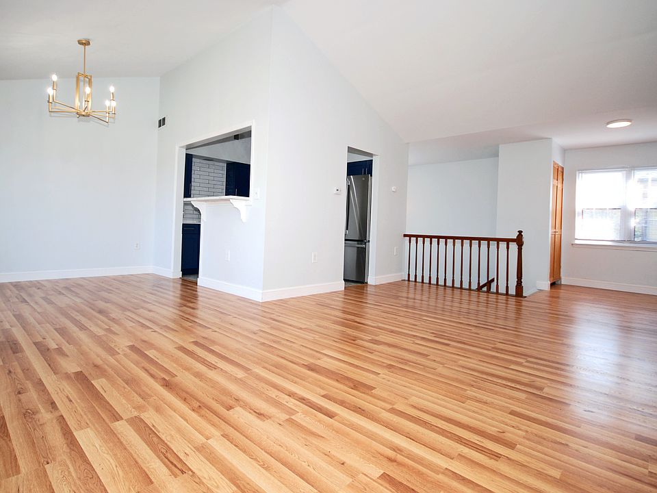 Living Room & Dining Room toward Kitchen and and stairwell