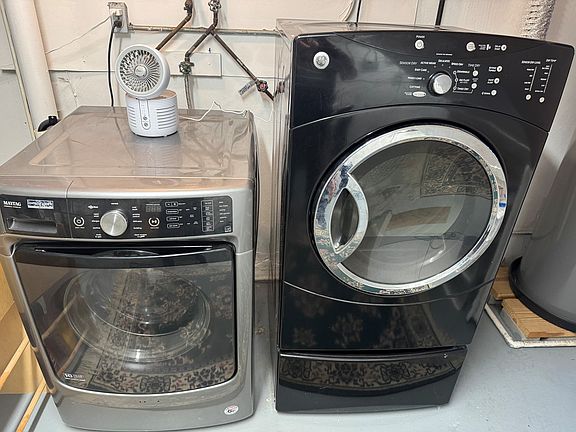 Washer dryer in common area. Washer is coin operated.