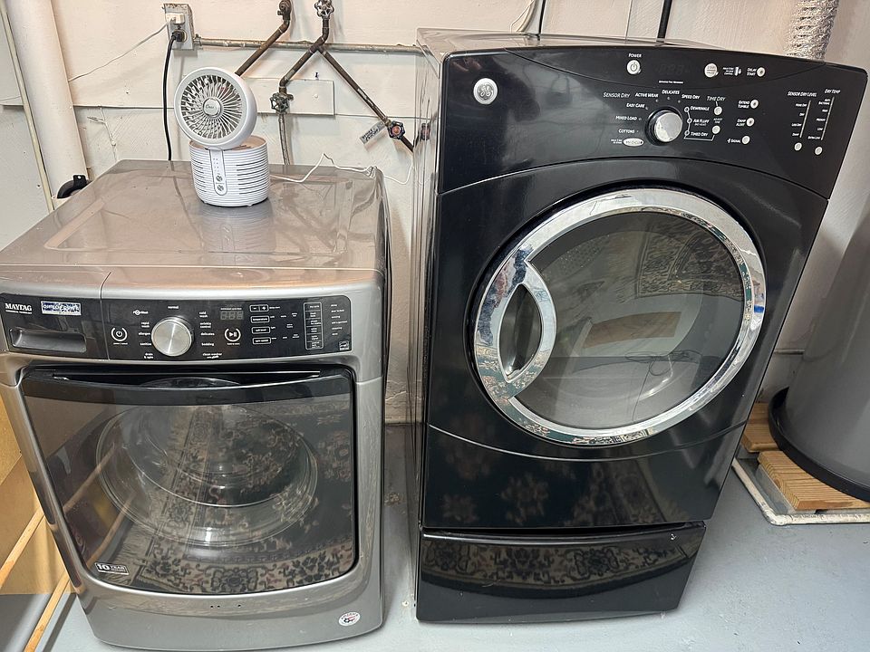 Washer dryer in common area. Washer is coin operated.