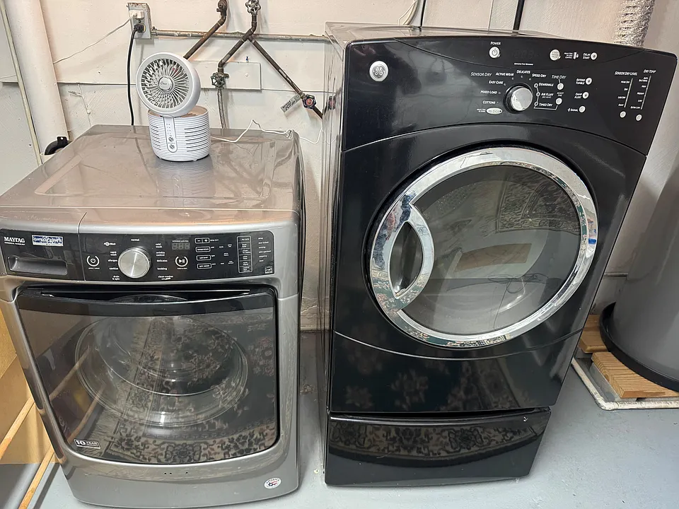 Washer dryer in common area. Washer is coin operated.