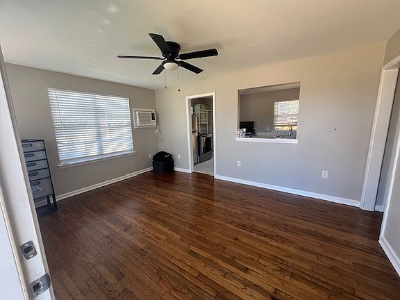 NO Carpet. Beautiful hardwood floors. This is the living room from the front door.