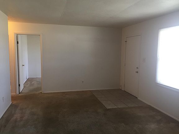 Living room and bedroom entry.