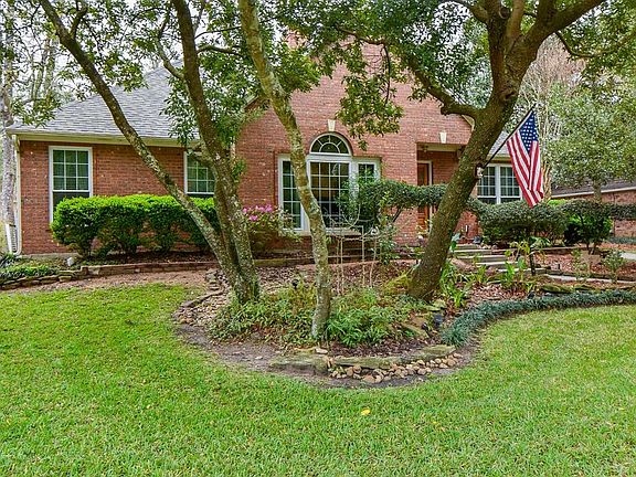 Charming path and steps lead to front door.