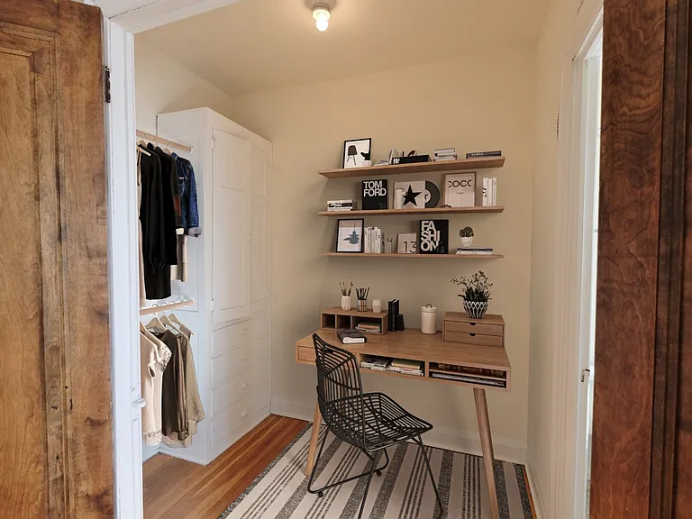 Welcome to Central Lakes of Uptown, where style meets functionality. This inviting workspace features chic shelving and ample storage for all your essentials. Transform your productivity in this perfect home office nook. Schedule a tour today!