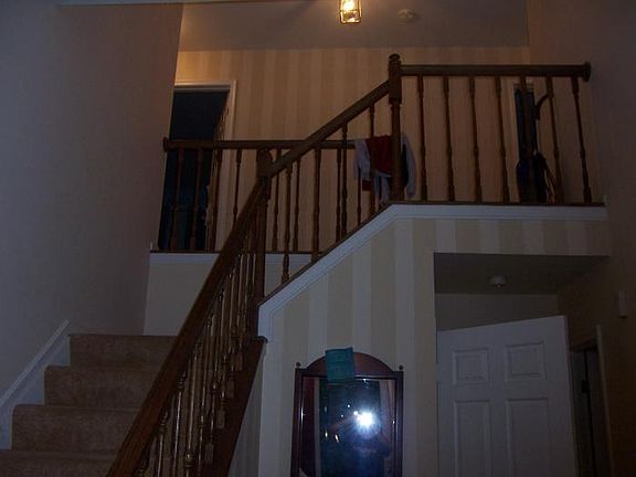 Foyer stairs to upstairs bedrooms
