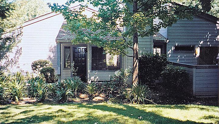 PREMIER, PRIVATE END LOCATION surrounded by trees and landscaping