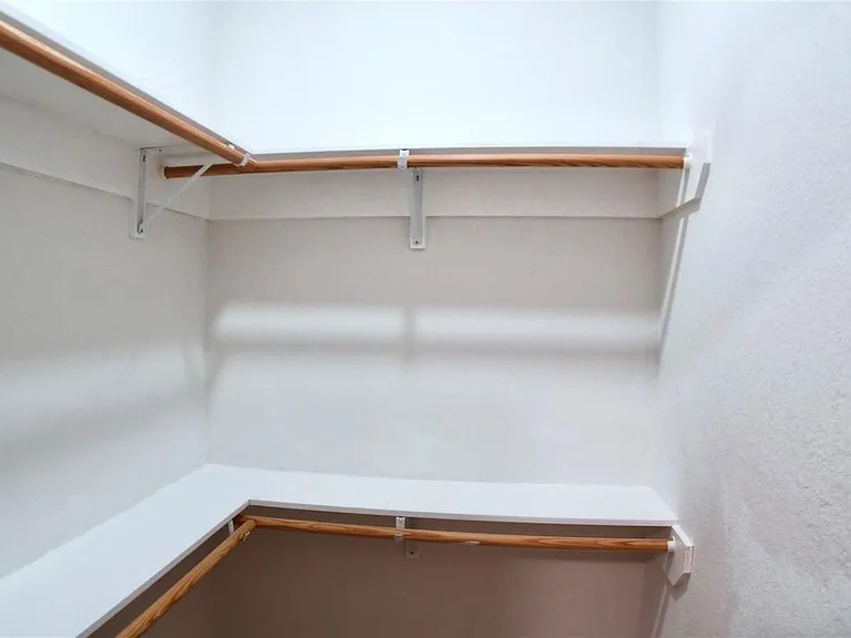 Master bedroom closet, upper view.