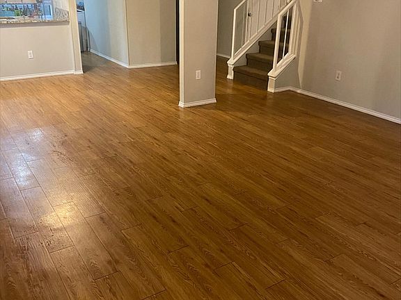 Beautiful Living Room view back to the kitchen and stairs!