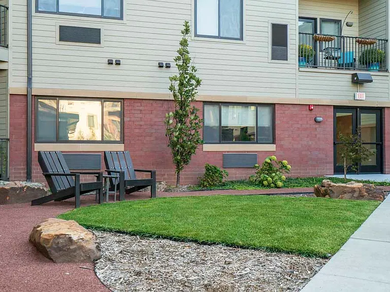 Scenic pathways wind through lush greenery, creating a peaceful retreat just steps from home.