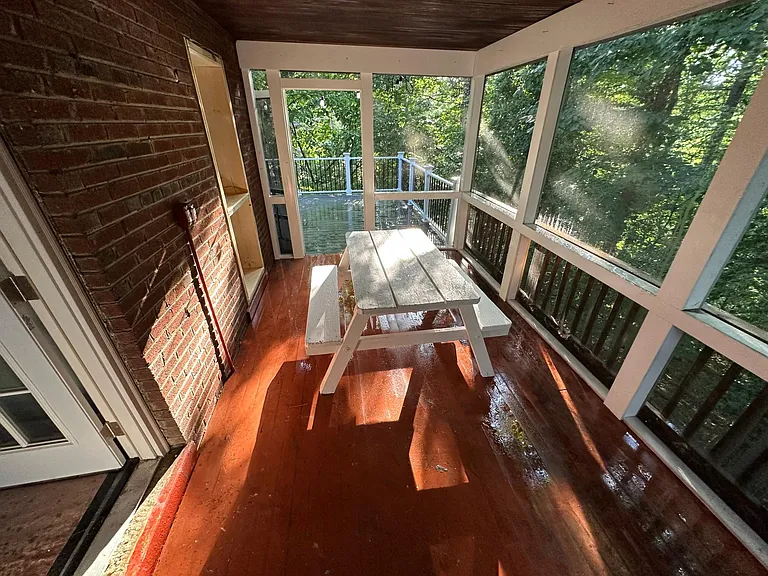 Sunroom on right side facing forest