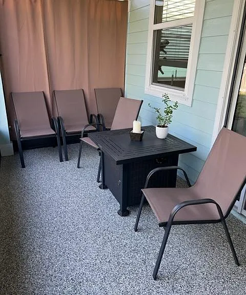 When it gets a little chilly, pull up the lid on the table and turn on the firepit. Use the extra chairs when you invite some friends over.