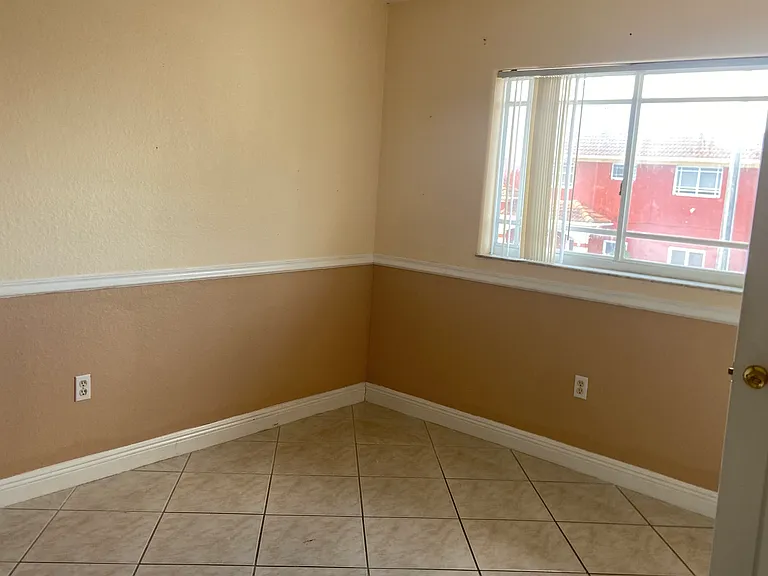 10925 W Okeechobee Rd #202 — Photo 11