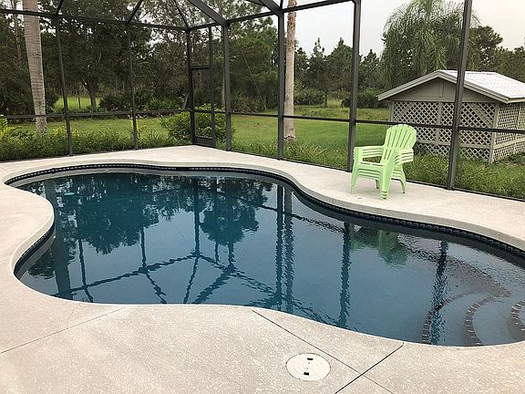 Caged Pool/Utility Building