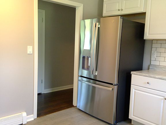 Kitchen with brand-new fridge with ice/water dispenser