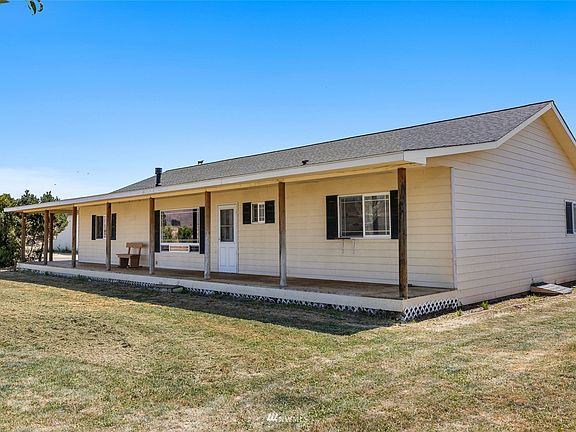 Single Story home with front & back covered porches!