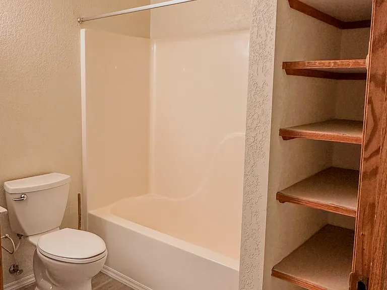 Clean, spacious full bathroom conveniently located for roommate living.
