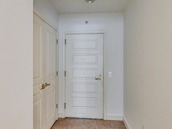 Additional closet behind the front door
