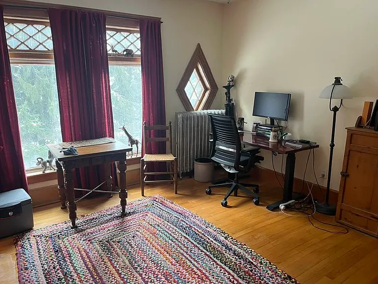 Attached to SE bedroom, this office faces west and has a large wardrobe for closet space.
