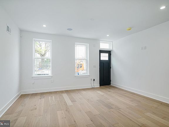 High ceilings and white oak flooring greets you