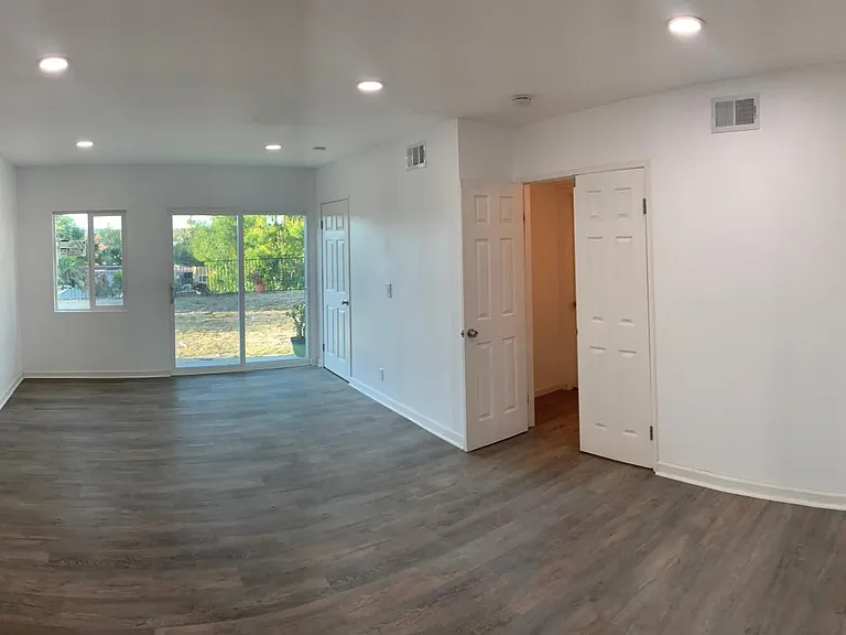 Master Bedroom - was 2 rooms and combined into one space.