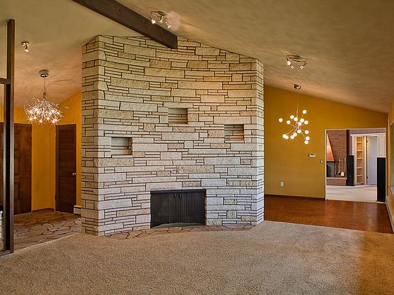 Fossil stone fireplace in Living room