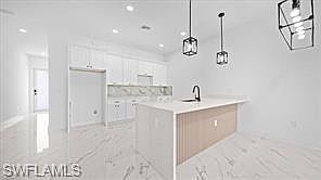 4th image of 1009/1011 NE 15th LN #1009 / 1011