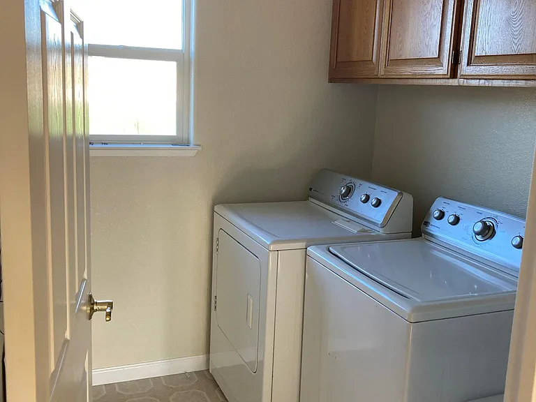 Laundry Room with full size washer/dryer.