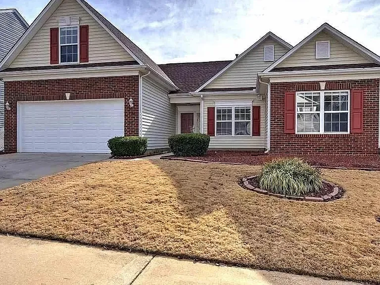 Brick Front, Two Car Garage