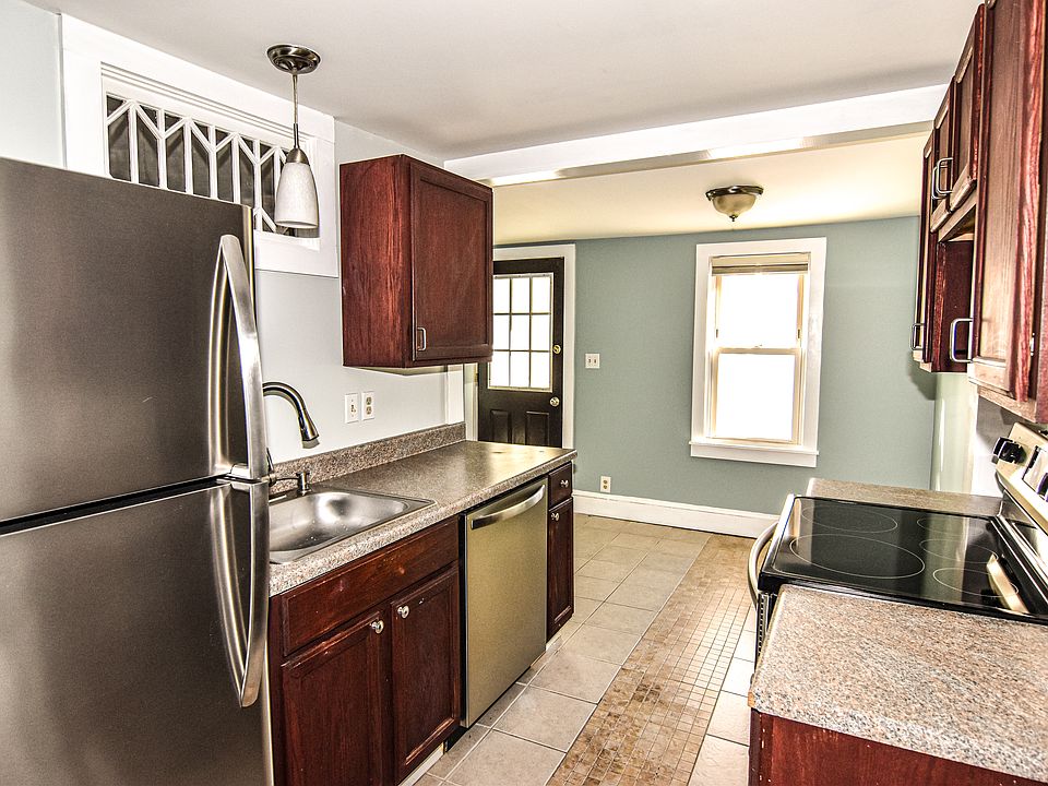 Kitchen includes stove, refrigerator and dishwasher