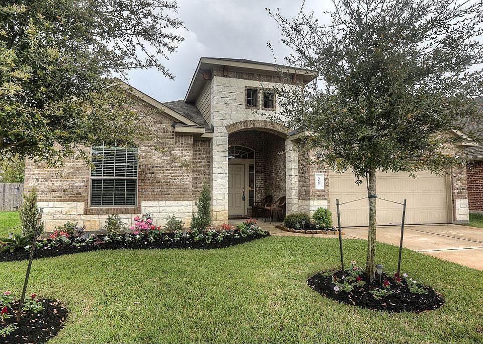 welcome Home! Gorgeous single story stone/brick elevation. Front covered porch.