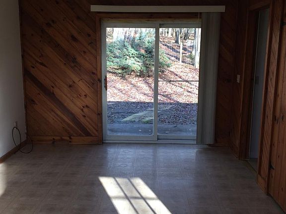 Living/Dining Area w/ Sliding Door To Backyard
