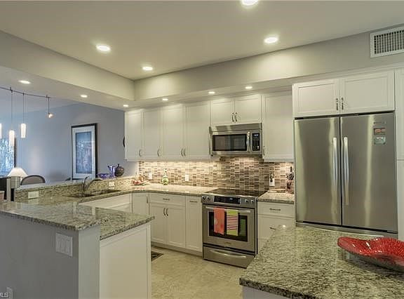 Beautifully renovated, granite countertops, granite island, SS appliances, new cabinets, spacious!