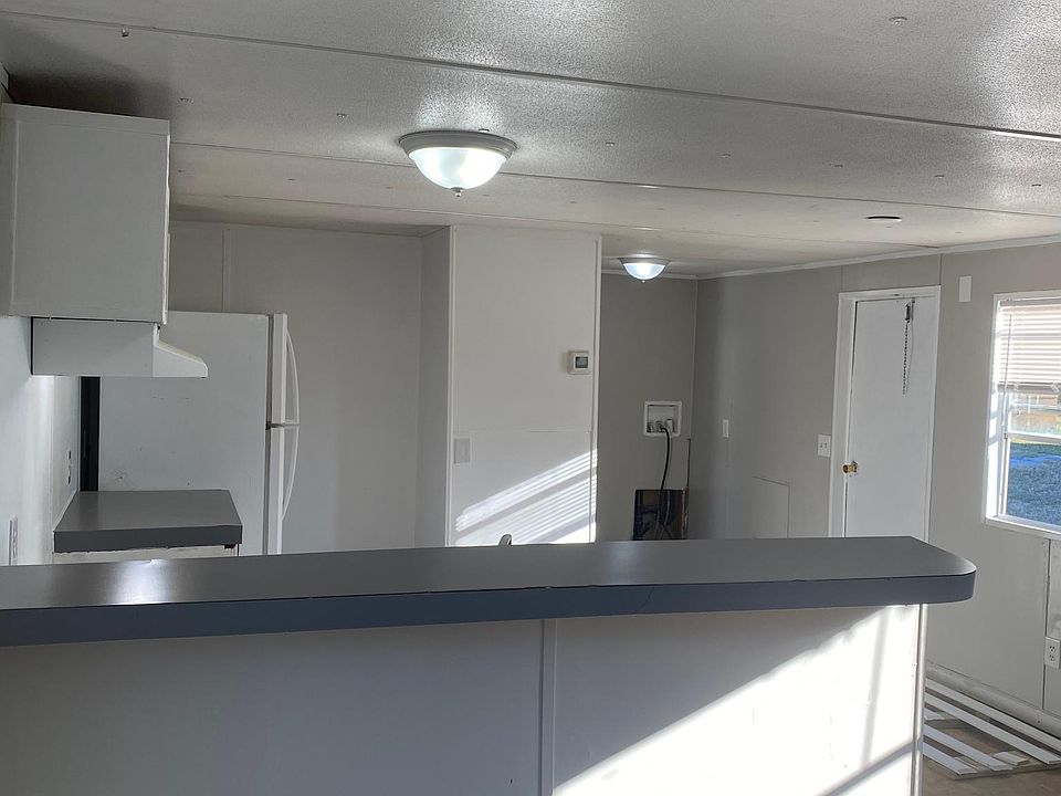 View of kitchen from living room