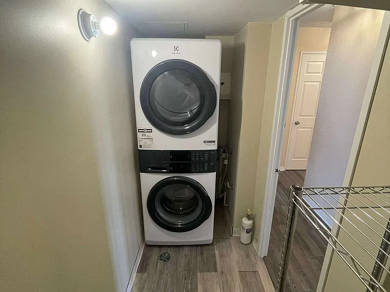 ensuite laundry with storage
