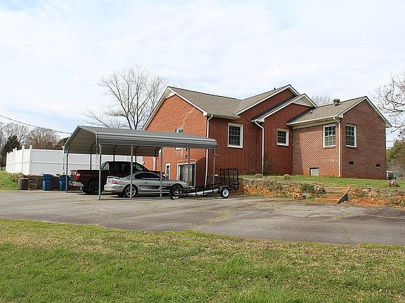 Back driveway with carport