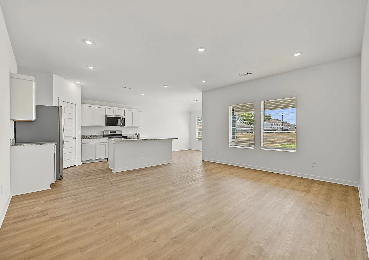 Light-Filled 4-Bedroom Home with Open Floor Plan — Photo 2