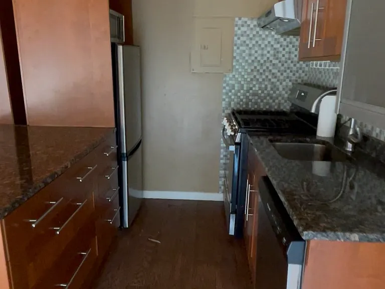 Updated kitchen with marble counter tops/breakfast bar
