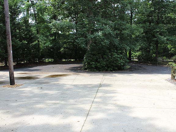 Driveway standing at garage