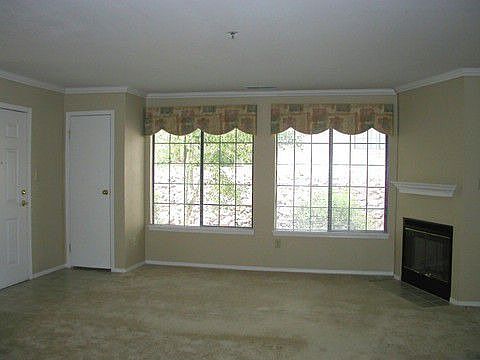 Spacious Living Room with Lots of Windows & Light