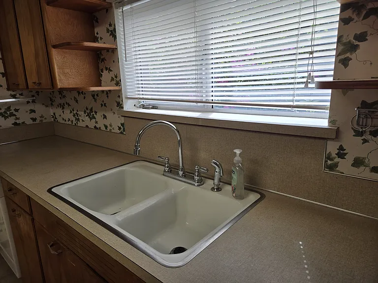 Kitchen Sink and Window looking to the west.