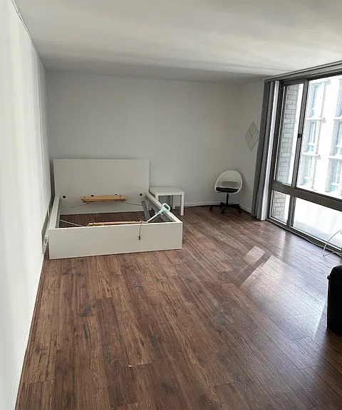 Bright, large, quiet studio space (Bed frame and end table included or can be removed)