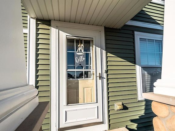 UPGRADED FRONT DOOR W/GLASS & STORM DOOR
